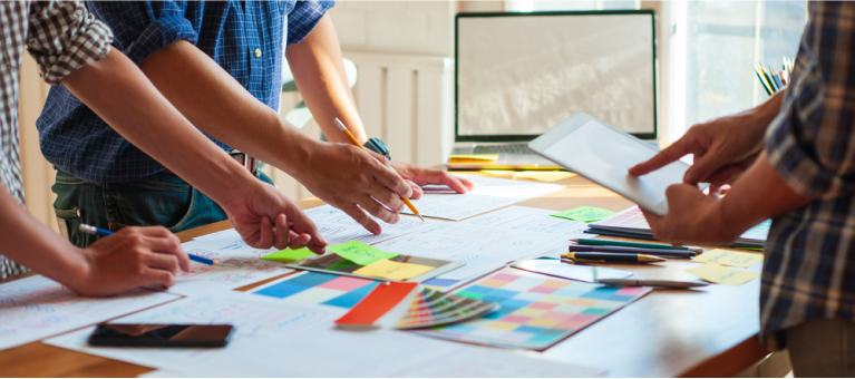 Three people planning a project